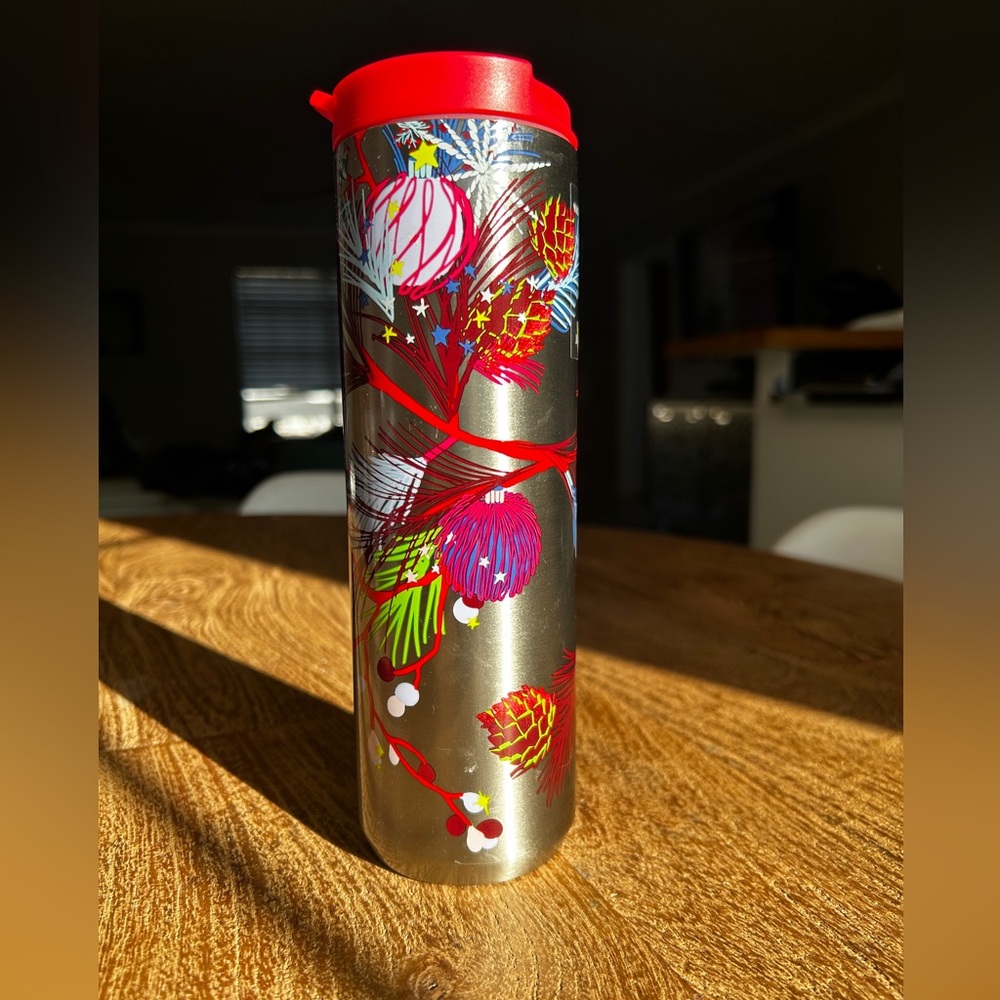 Starbucks, Christmas, Tumblr vacuum sealed 16 ounce red lid, silver background.